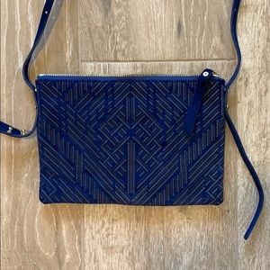 Adjustable side strap royal blue purse